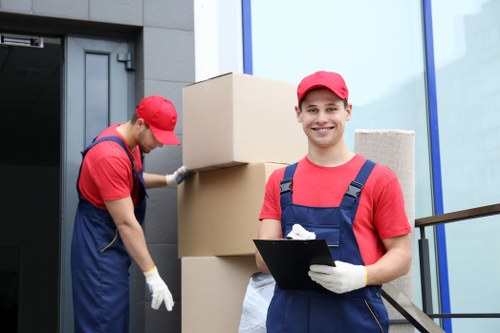 Packing boxes and organising household items in Colliers Wood home move