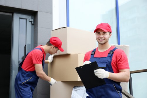 Same day removals team working in a Colliers Wood residential street