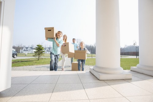 Staff using careful manual handling during a move