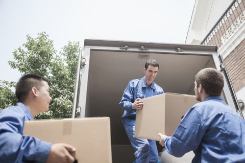 A man with van service helping with a local move in Colliers Wood