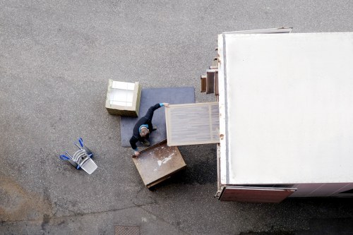 A local moving team unloading boxes at a new Colliers Wood home