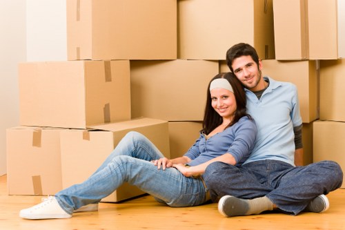 Local removal service loading furniture and boxes for delivery in Colliers Wood