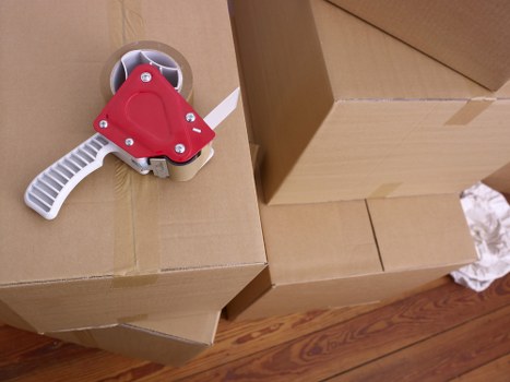 Packing boxes and materials prepared for a local move in Colliers Wood