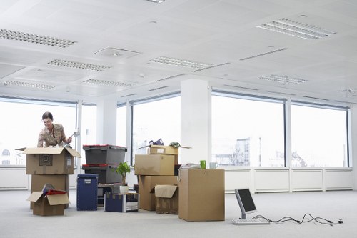 Colliers Wood moving service handling boxes during a relocation