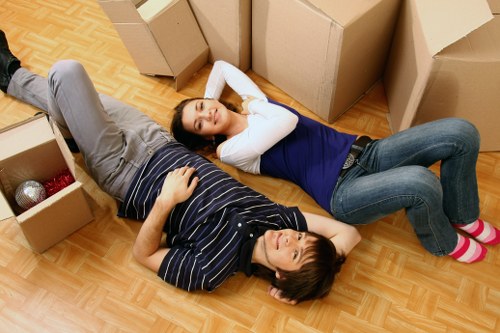 Professional man with van service handling office and home items